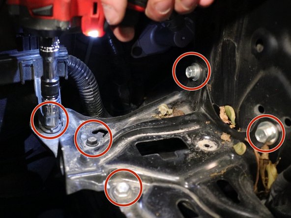 Unbolt the battery tray and remove it from the car.