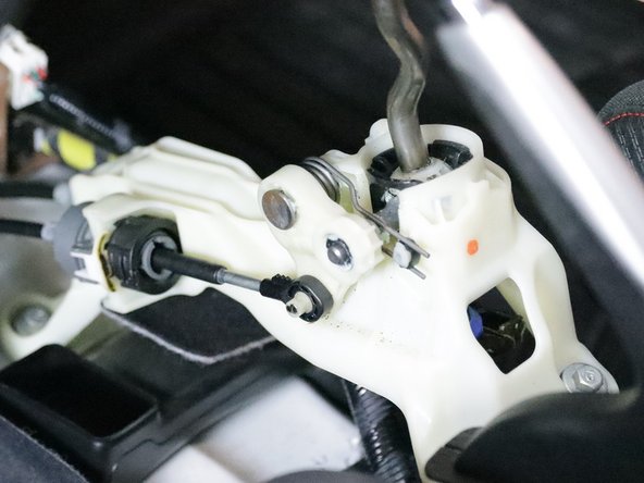 Remove the left side shifter cable by removing the retaining pin.