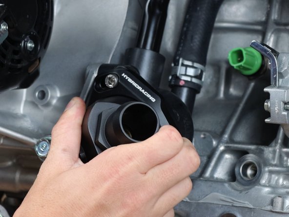 Position the housing as necessary. Once you have chosen the location, you can tighten all bolts to 7.2ft lbs.