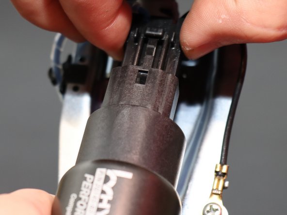 Once the hose and clamps are in place, plug the fuel pump in to the OE harness.