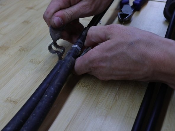 Remove the bracket and transfer it to the HR cables. You will need to bend the metal tabs apart.