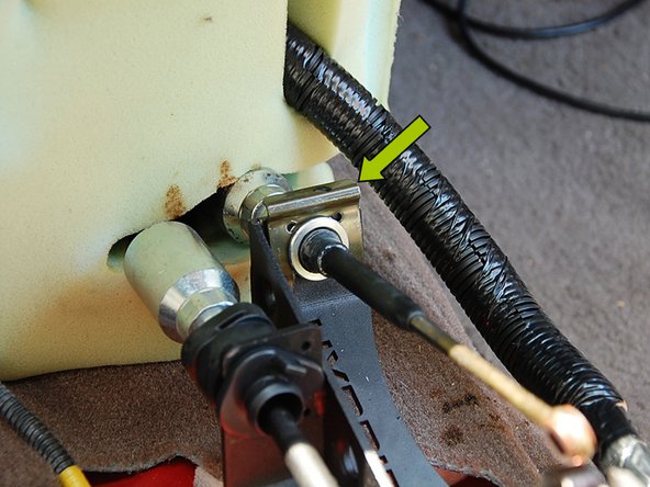 Next slide the right side cable into the shifter (1st picture) and install the C-clip to secure the cable (2nd picture).