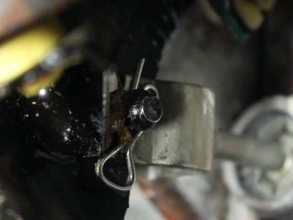 Locate and remove the clutch master cylinder pin.