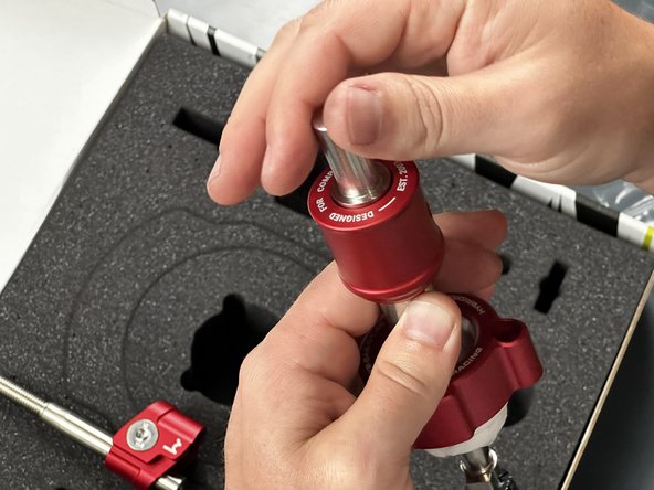 Locate the Shift Boot Collar (#5) and slide it onto the Shifter Main Rod.