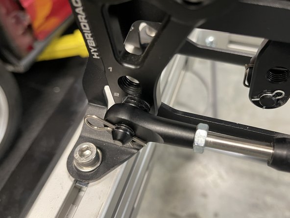 Now install the other cable in the same way as the previous cable. Use the supplied clip and attach it to the shifter arm.