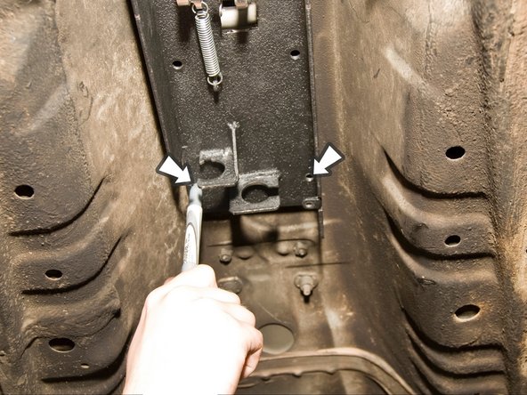 Locate the two front mounting holes for the shifter.