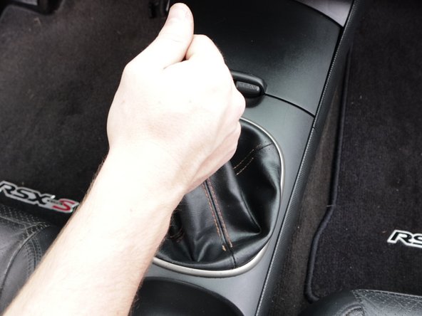 Test the shifter and make sure it engages in each gear, including reverse. Make any adjustments to the console or shifter before driving.