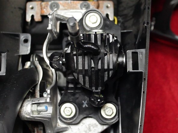 Once the shifter assembly has been fully exposed, remove the 3 mounting bolts.