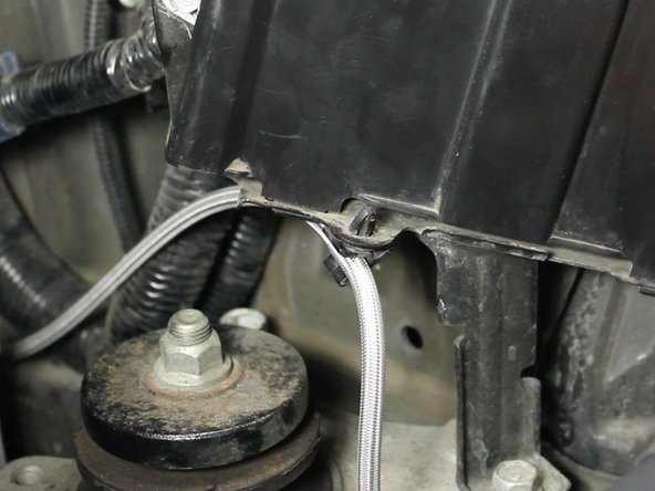 Optional - The new clutch line will be able to mount in the factory hard line clips. 