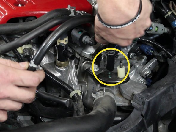Install the line from the upper section of the IACV located on the throttle body and the coolant housing.