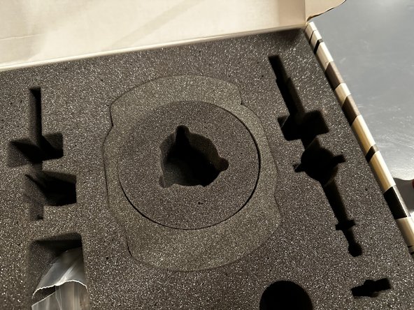 Locate the Shift Insulator foam located as part of the box packing.