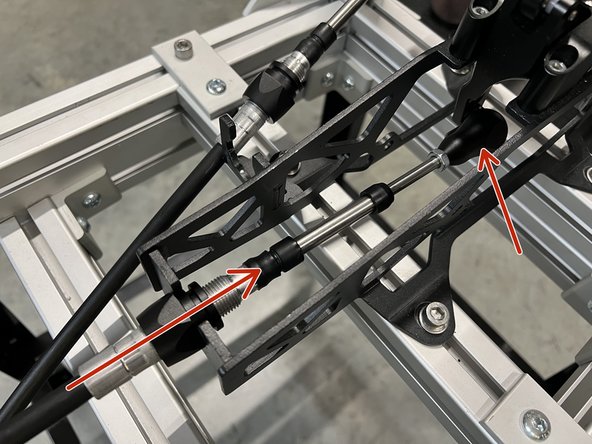 Insert the shifter cables through the shifter base and secure them to the shifter with cotter pins. We do not supply the shifter side hardware.