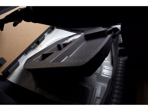 Begin installing the electronic valve controller by lifting and removing the factory FK8 rear foam tray.