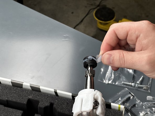 Apply the remaining grease to the outside of the Shifter Ball Cup.