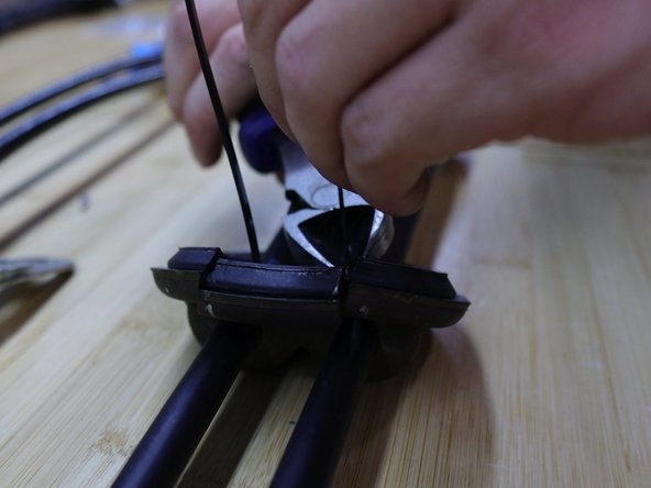 Secure the floor seal with both supplied zip ties. These ties help the cable stay in place.