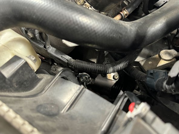 Use a 17mm and 14mm open-ended wrench.