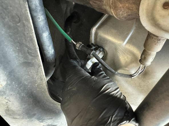 Unclip Oxygen sensor from black metal stand-off mount