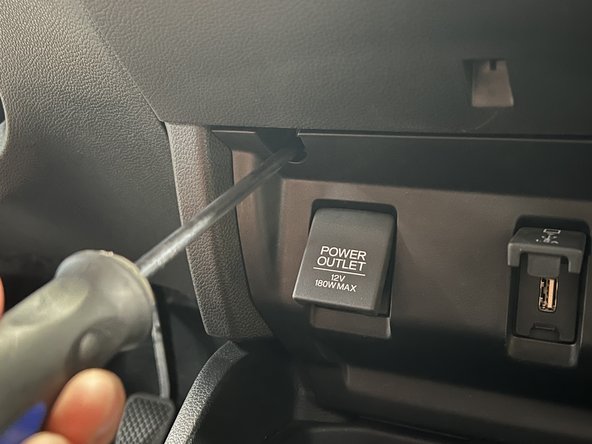 Unscrew the front panel and remove it.