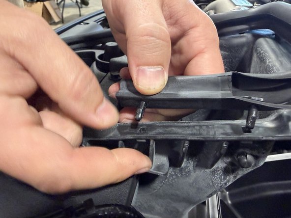 Be careful and go slow so you do not rip the seal or break the clips.