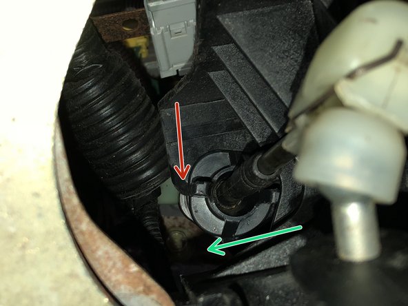 Rotate the shifter cable lock and slide it out of the shifter.