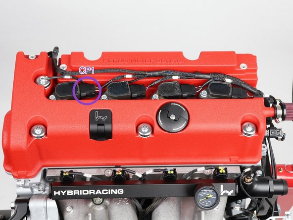 Lay the coil sub-harness across the valve cover and plug in the four coils in order, CP1 through CP4 from the chain side (the violet ring marks CP1).
