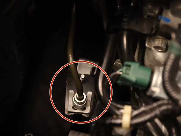 Unbolt the clutch line brackets.