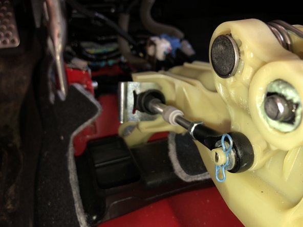 Repeat the same steps on the LH side of the shifter. Install the cable using the supplied clip, then slide on the cable end securing it with the retaining pin.