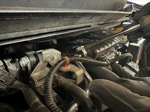 Tighten throttle body clamp