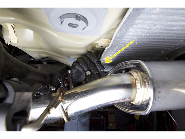 Run the wiring above the heat shield, make sure nothing touches the exhaust pipes.