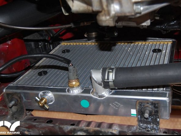 Install the Fan Switch sensor into the bottom bung. (connect to your conversion harness)