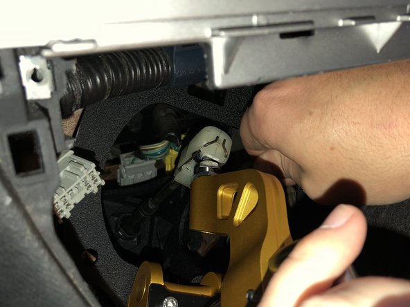 Reinstall the shifter cable end links on to the new shifter.