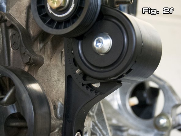 Shown from left to right is (1) spring housing, (1) bolt backing plate, and (3) M8 bolts and M8 lock washers. Torque all three M8 bolts to 35 lb-ft (dry) or 28 lb-ft (lubricated with oil). Failure to properly torque bolts can result in premature fatigue or loosening of the bolts