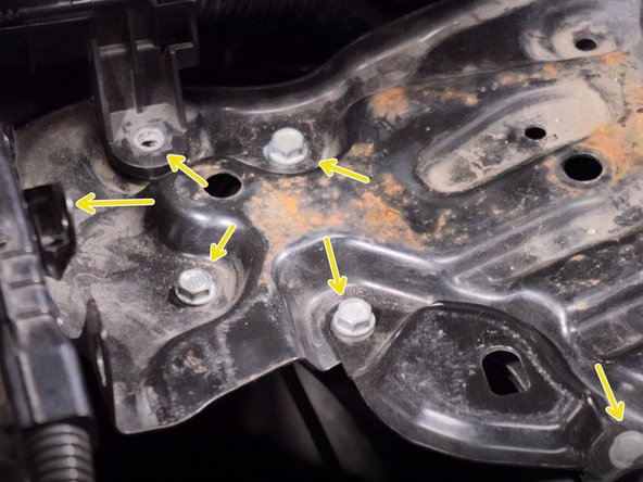 Remove the 10mm bolts on the battery tray.