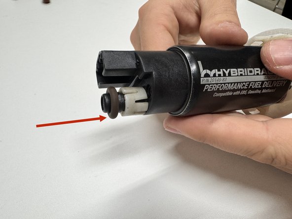 This is easiest done using a small socket which helps you push it all the way down.