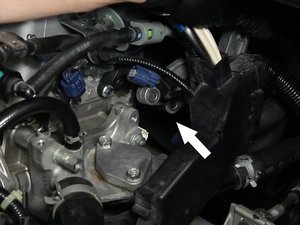 Remove the OEM air intake support bracket.