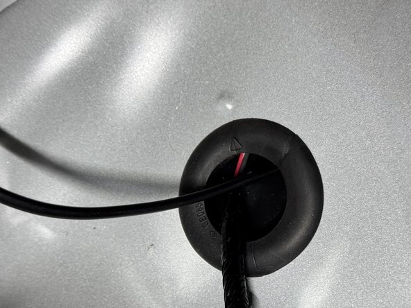 Pull all but a little slack through the floor and prepare to mount the controller box.