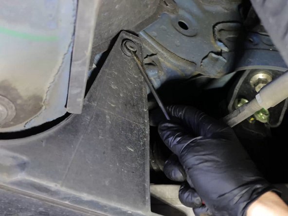 Under the car, remove the plastic under tray to gain access to the heat shielding and exhaust.