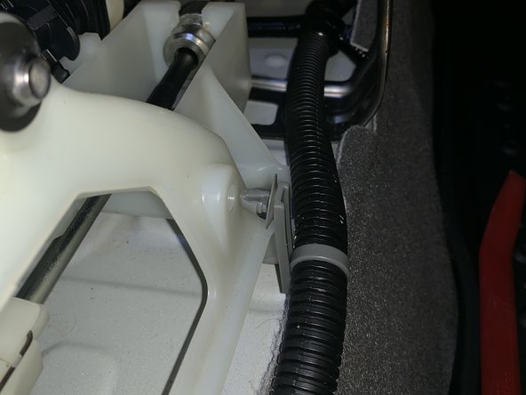 Remove the wiring harness from the shifter base.