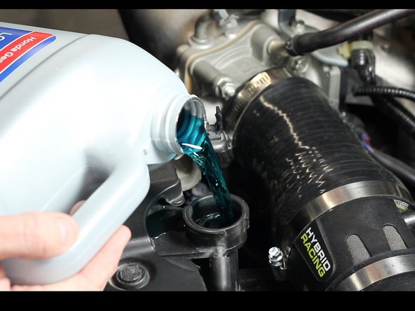 Once all of the parts are tight, fill the system with coolant and bring the engine up to operating temperature. Check for and fix all leaks.