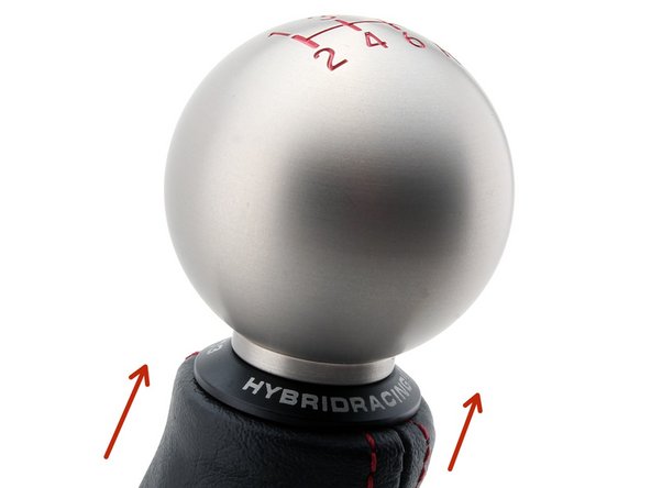 Install the shift knob and position it to your liking. Use a wrench and tighten the sleeve against the collar.