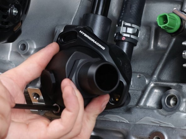 Once you have tighten everything, you can now install the thermostat neck onto the OEM housing.