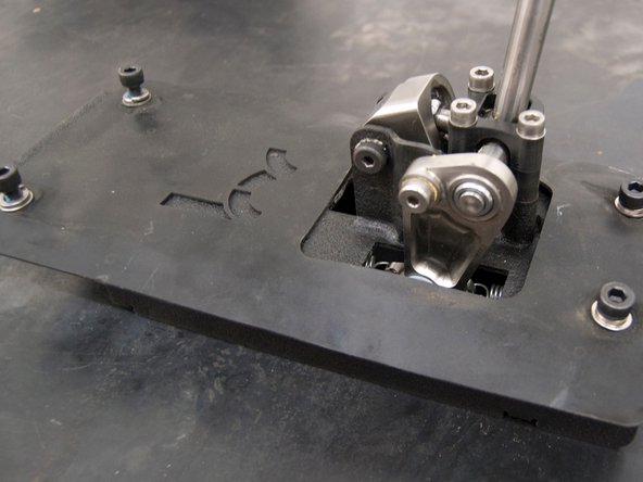 Before bolting the shifter to the chassis, place the included rubber seal on top of the shifter.