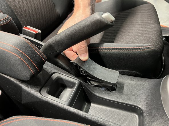 Remove the console cover.