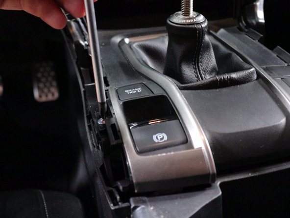 Remove the shift knob and boot collar.