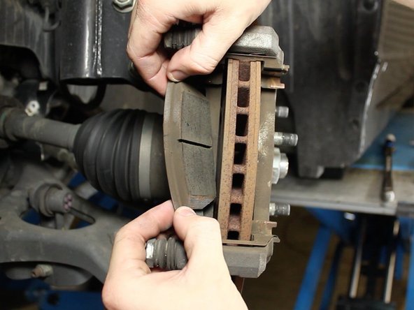 Remove the brakes pads.