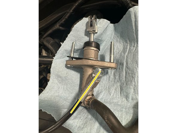 Put the Clutch Line on the left side of Reservoir hose as shown in Picture 2.