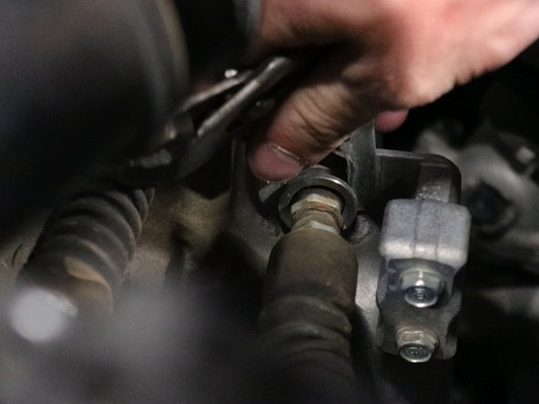 Start at the end and work your way inward, grab them with plies and pull them upwards once they are loose.