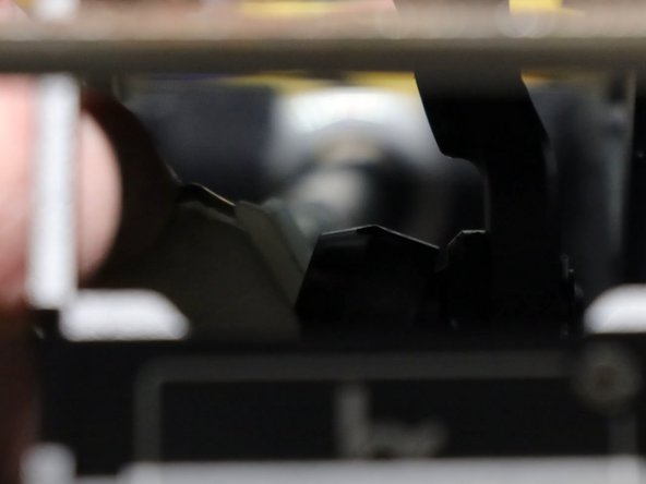 This cable should be completely free from the shifter now.