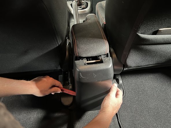 Start at the top and work your way down. Use your hands to separate the plastic clips.