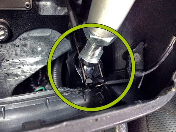 The easiest thing to do is use a dremel and grind the plastic out of the way, but It can be done with a razor blade as well.